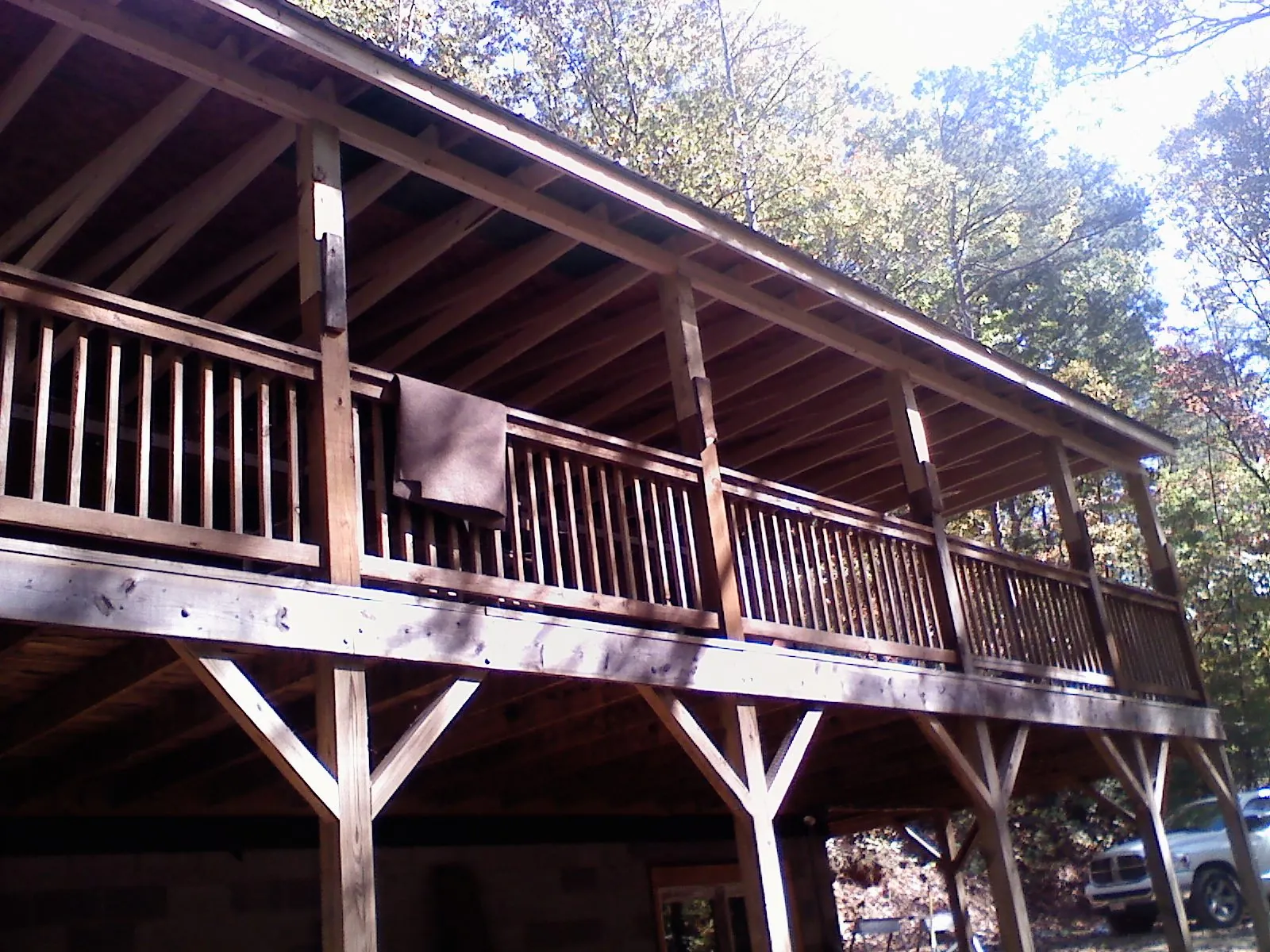 Timber framing under a new elevated porch and deck — Roof Leak Repair in Rio Rancho by Roofing Brothers